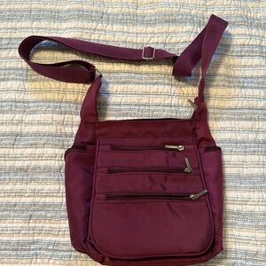 Like new Organizzi travel crossbody purse